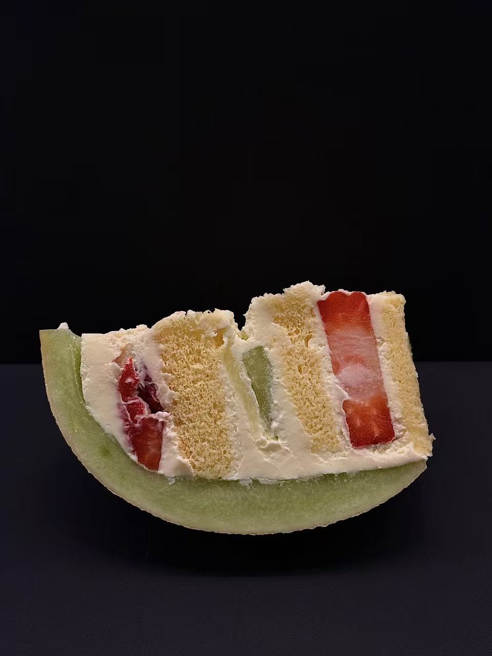 Melon Cake opened to show its layered interior