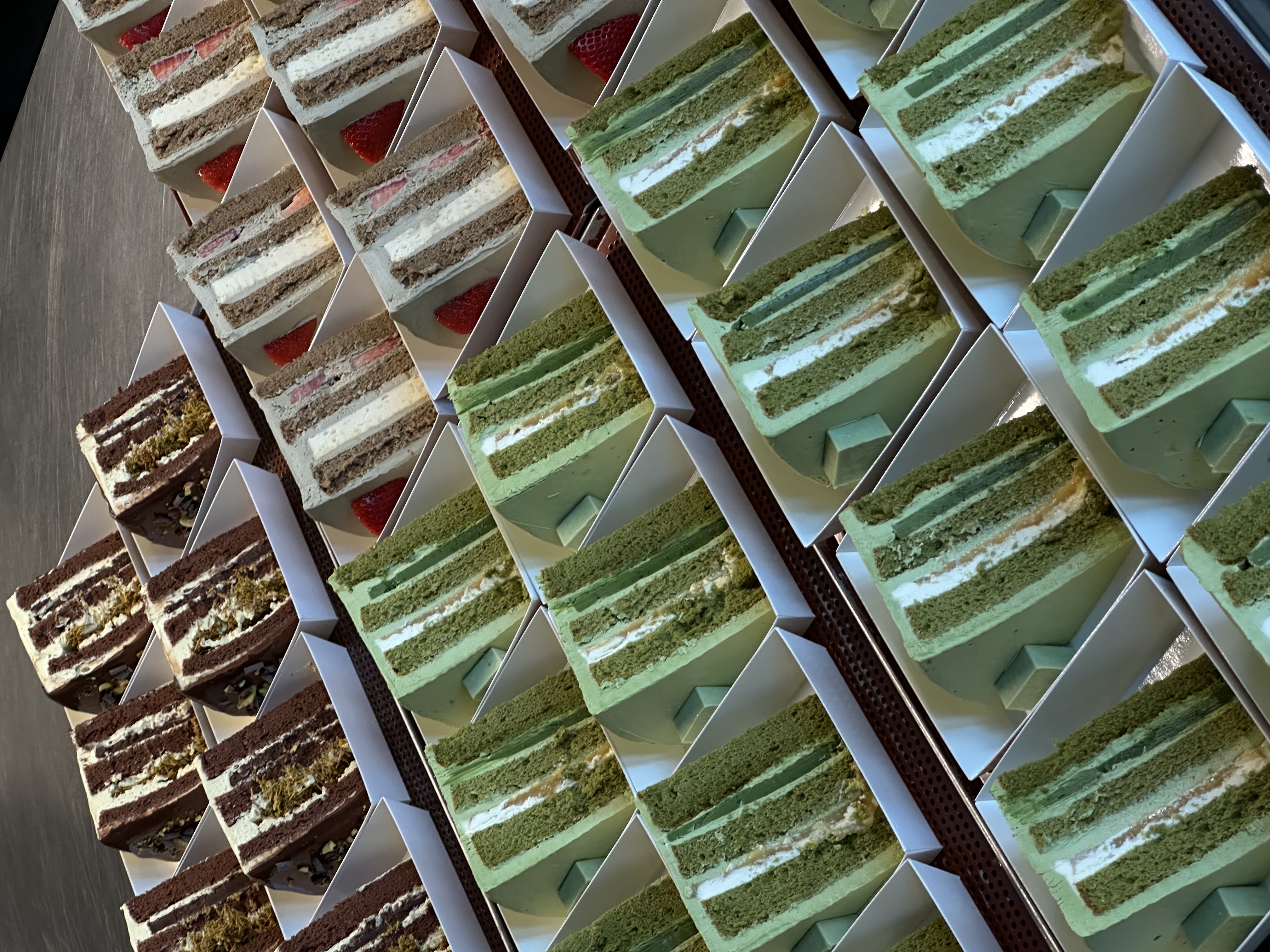 Assorted cake cross-sections showing layered textures