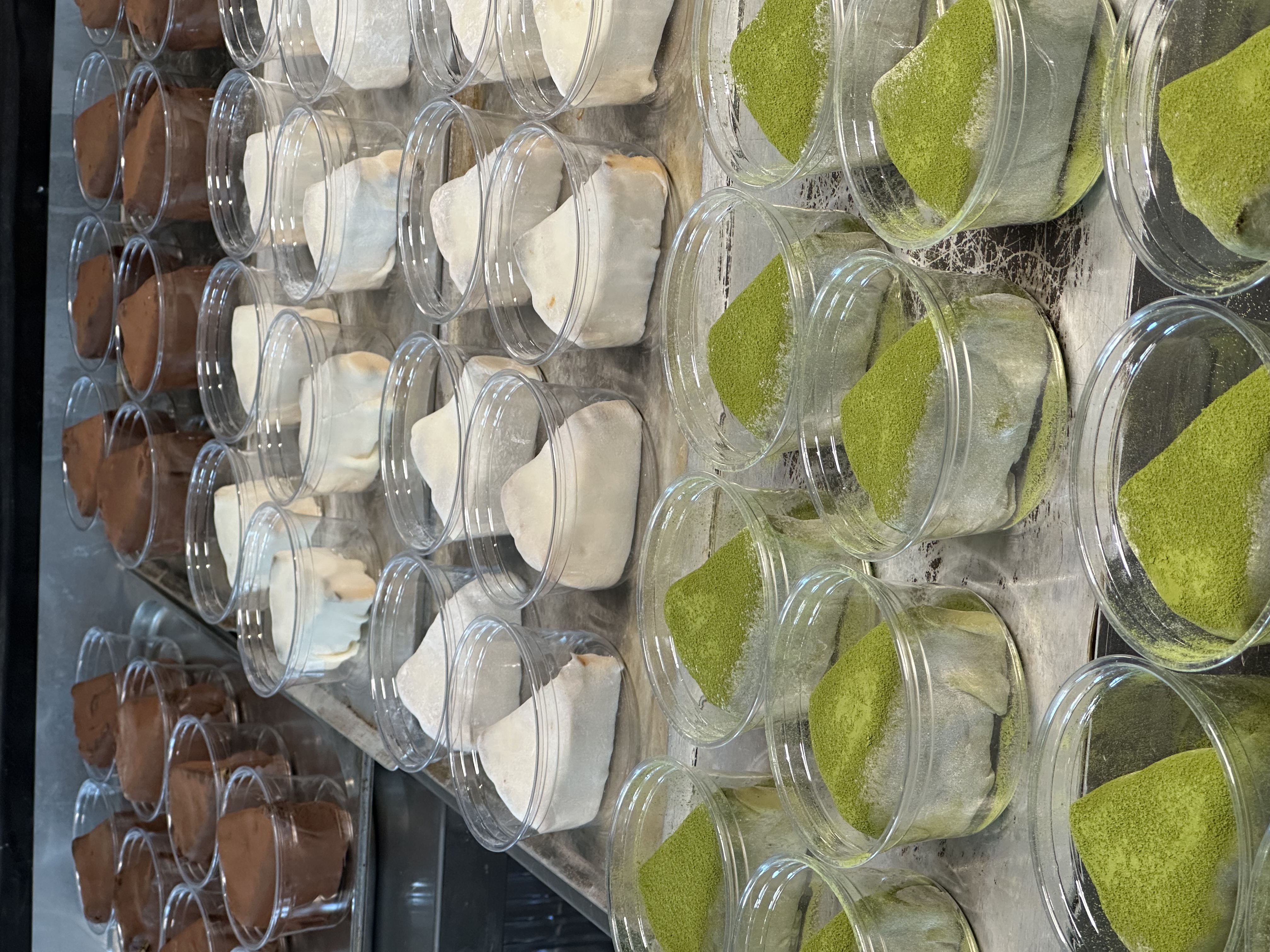 Assorted slices showing cake layers and creams